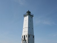 Frankfort Lighthouse. The original Frankfort North Breakwater lighthouse was built in 1873 at the end of a long wooden pier with an elevated catwalk which led to the shore. In 1932, the current lighthouse was situated at the end of what is now the northern concrete pier.